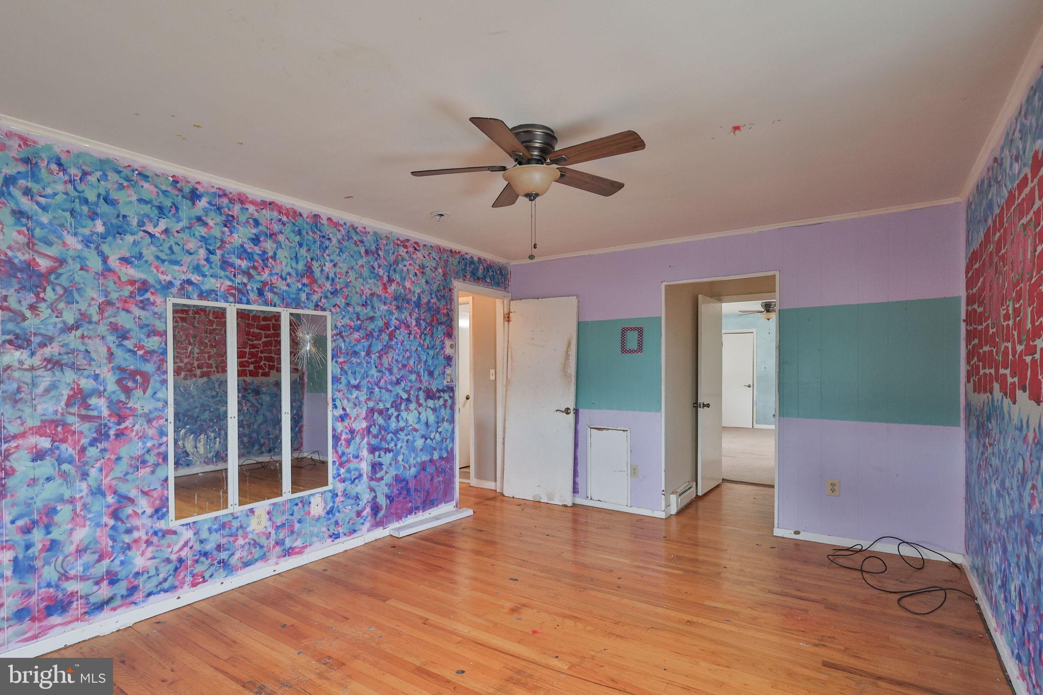 210 South 16th Street Emmaus, PA 18049 - Photo 54 of 92 a view of an empty room with a window and a ceiling fan