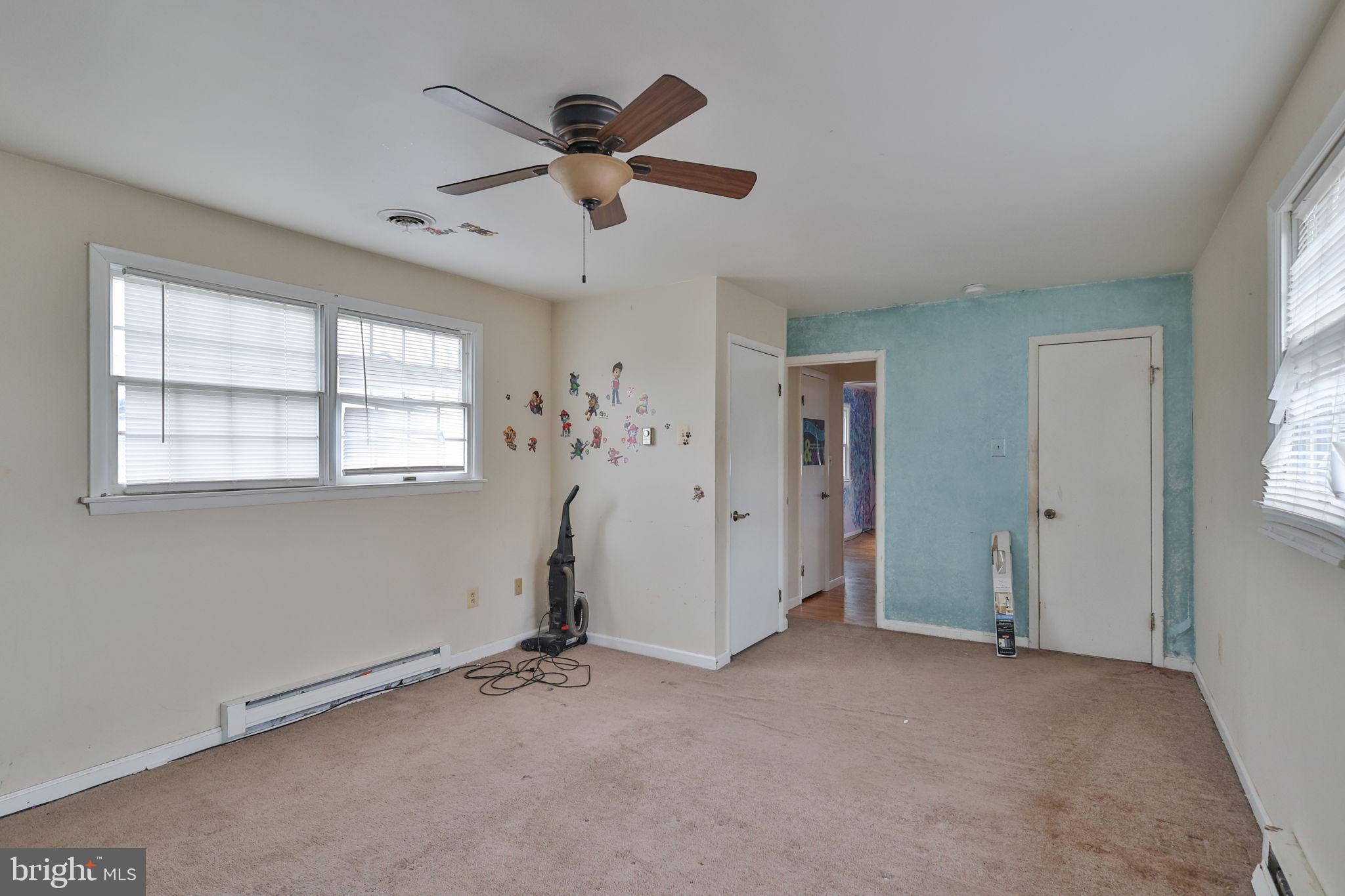 210 South 16th Street Emmaus, PA 18049 - Photo 58 of 92 a view of empty room with wooden floor and fan