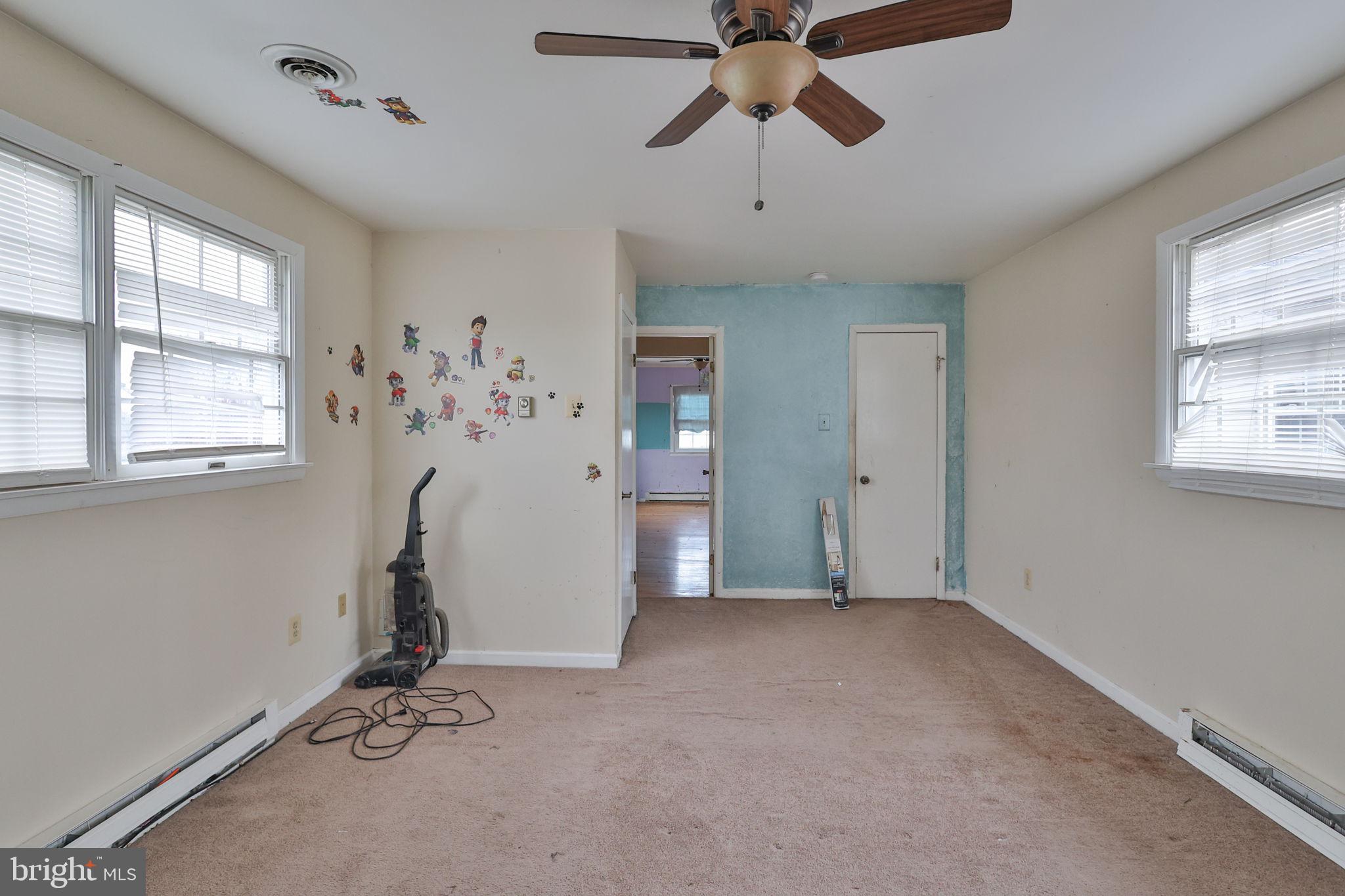 210 South 16th Street Emmaus, PA 18049 - Photo 59 of 92 a view of a room with gym equipment and windows