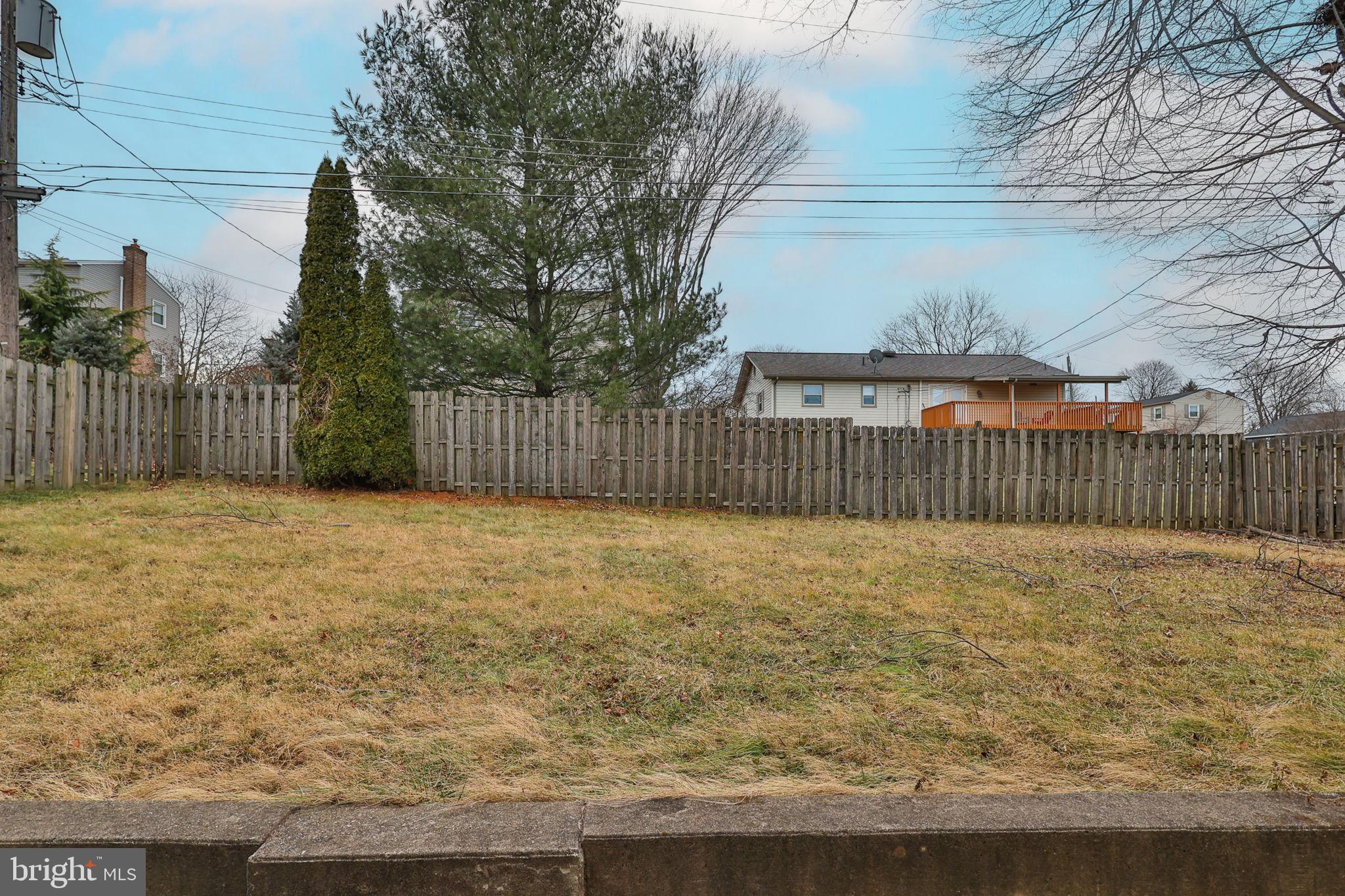 210 South 16th Street Emmaus, PA 18049 - Photo 85 of 92 a view of backyard with wooden fence and trees