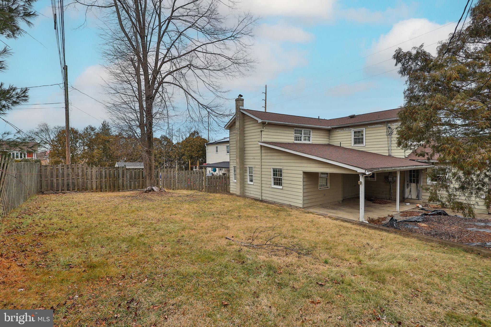 210 South 16th Street Emmaus, PA 18049 - Photo 87 of 92 a front view of house with yard and trees in the background