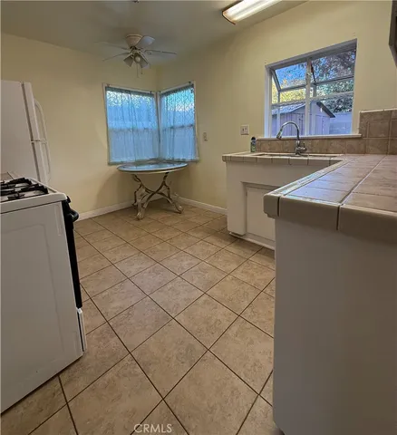 a room with a table and white walls