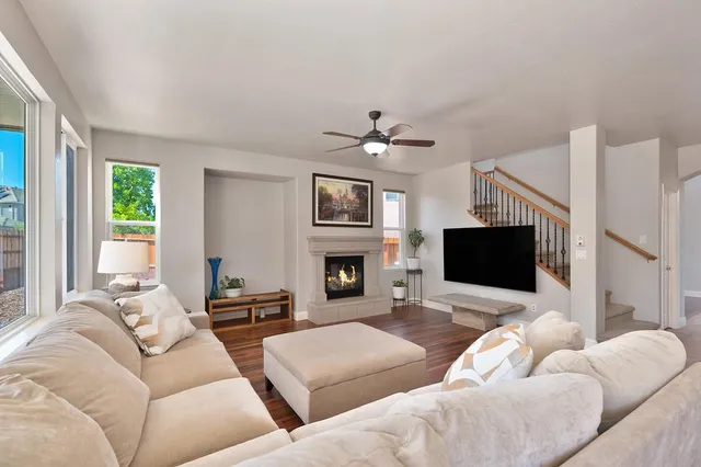 a en suite bathroom with a tub sink and mirror