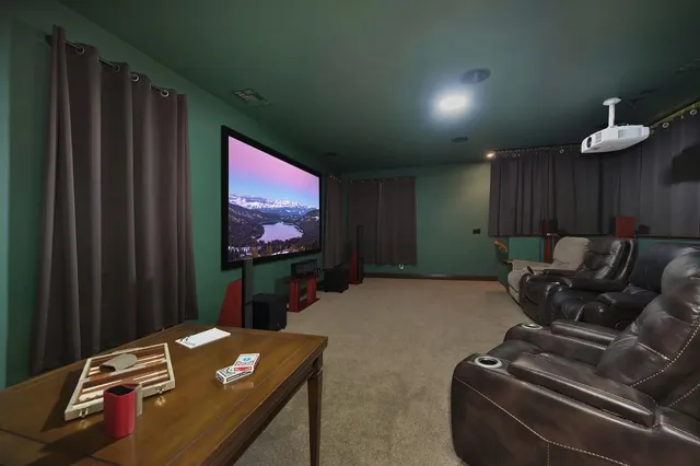 a spacious bathroom with a double vanity sink and a mirror