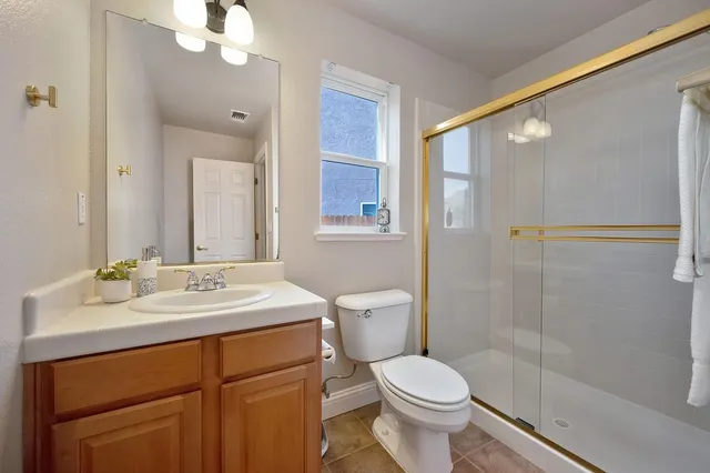 a view of a backyard with a patio