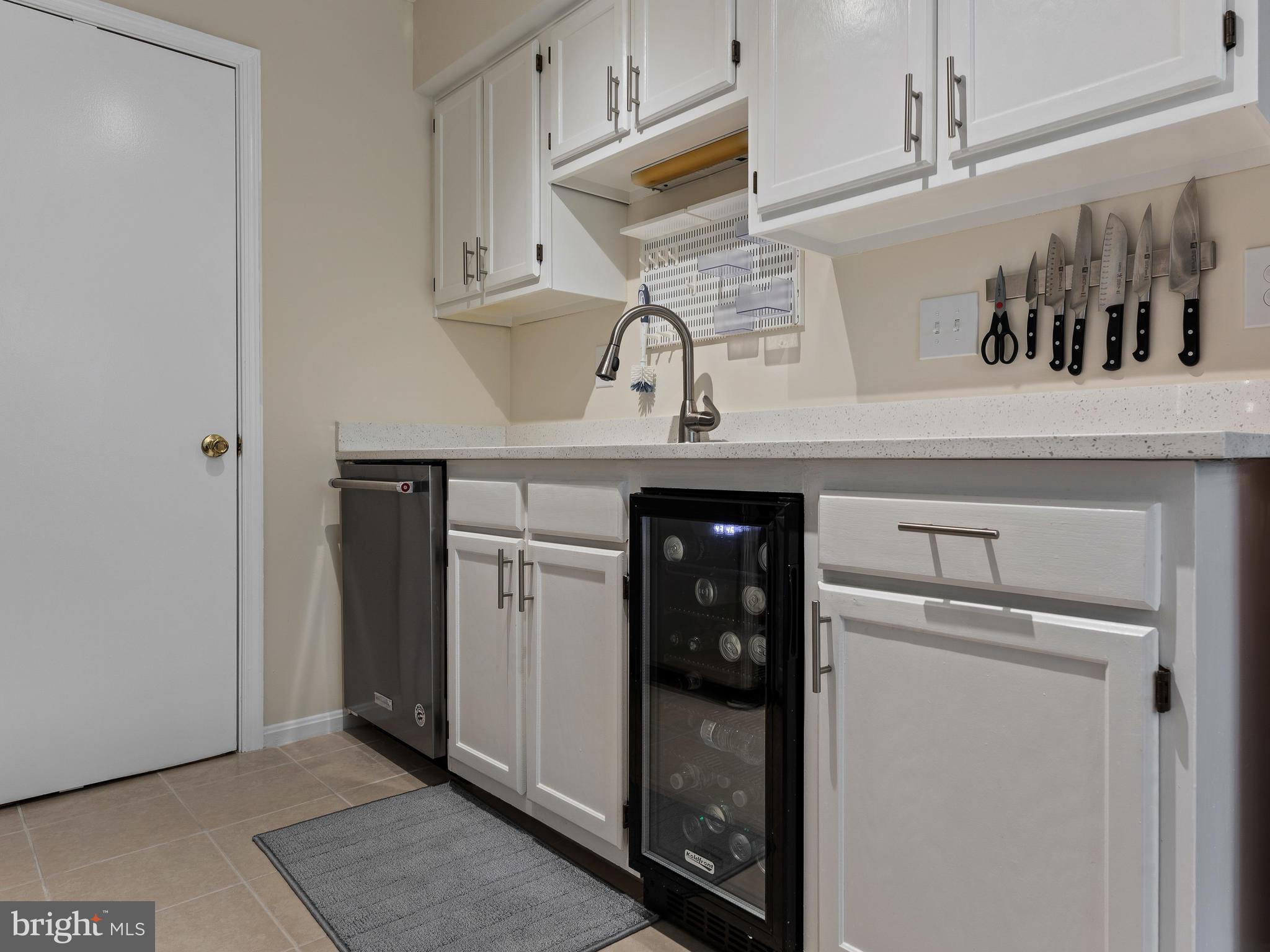 14905 McKisson Court, Unit E Silver Spring, MD 20906 - Photo 12 of 32 Installed wine cooler and extra storage