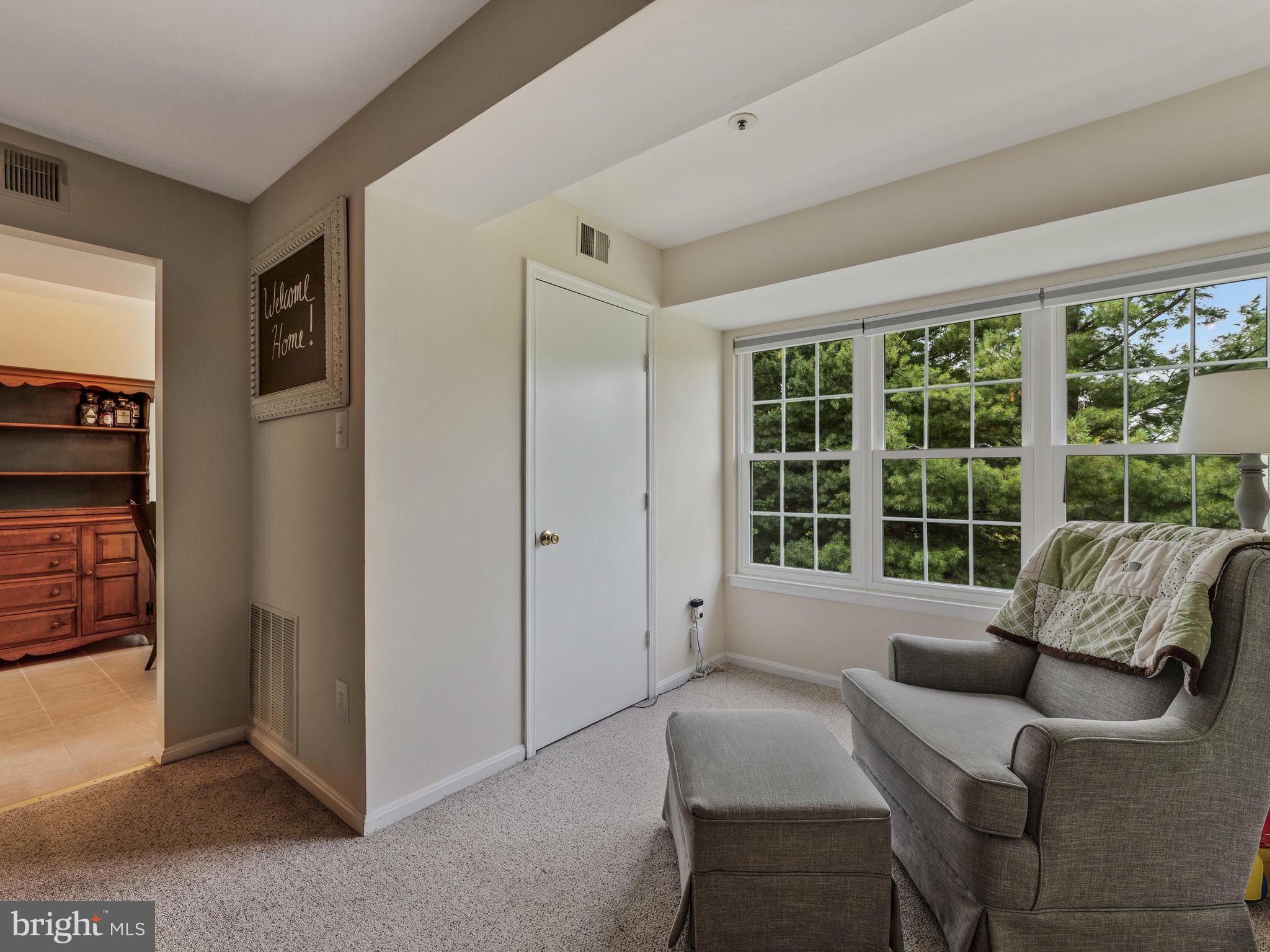14905 McKisson Court, Unit E Silver Spring, MD 20906 - Photo 6 of 32 Extended living room for a reading nook/play area
