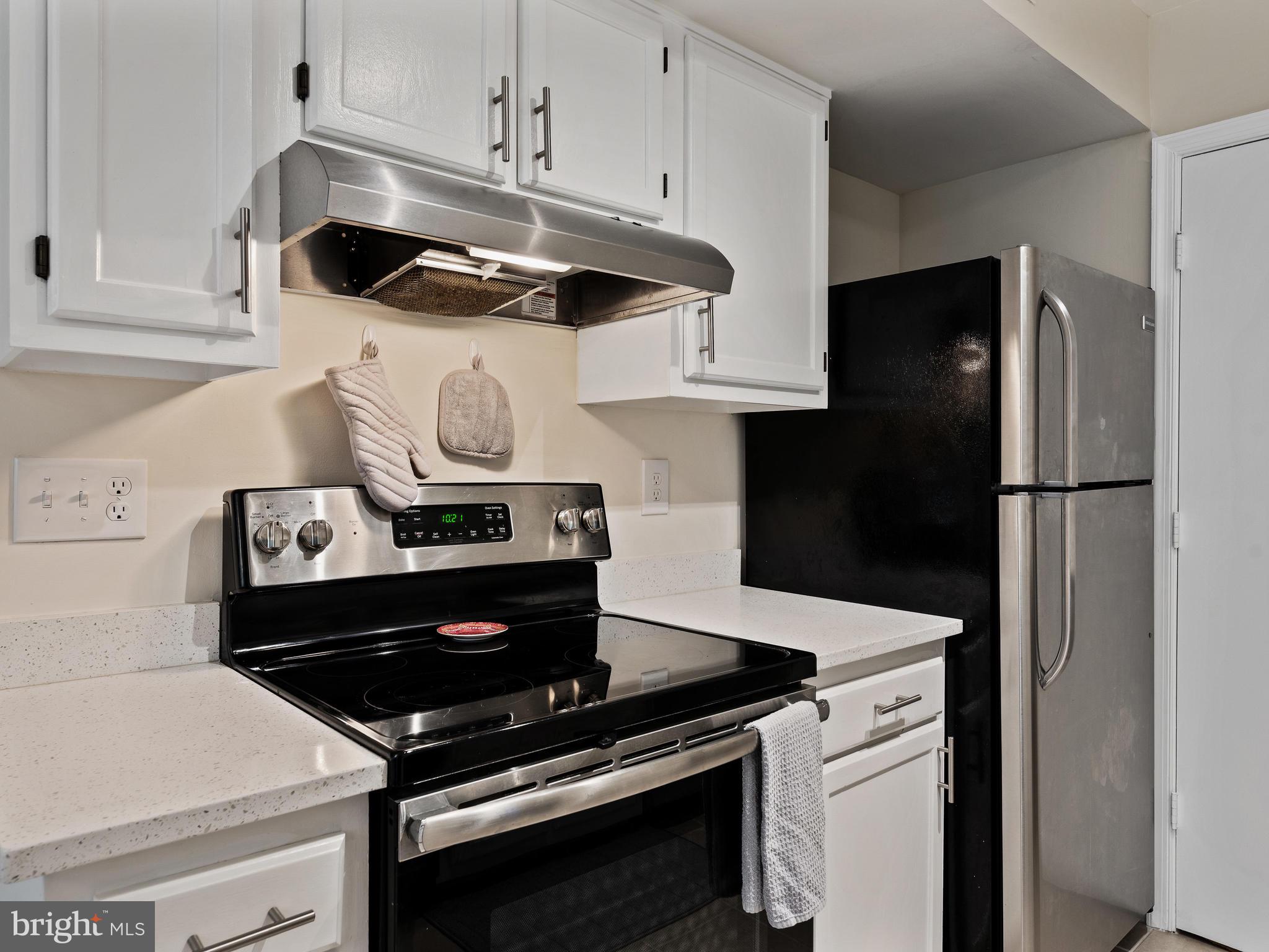 14905 McKisson Court, Unit E Silver Spring, MD 20906 - Photo 10 of 32 Newer stainless steel appliances