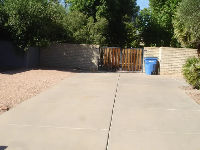 a view of a fire pit in front of a yard