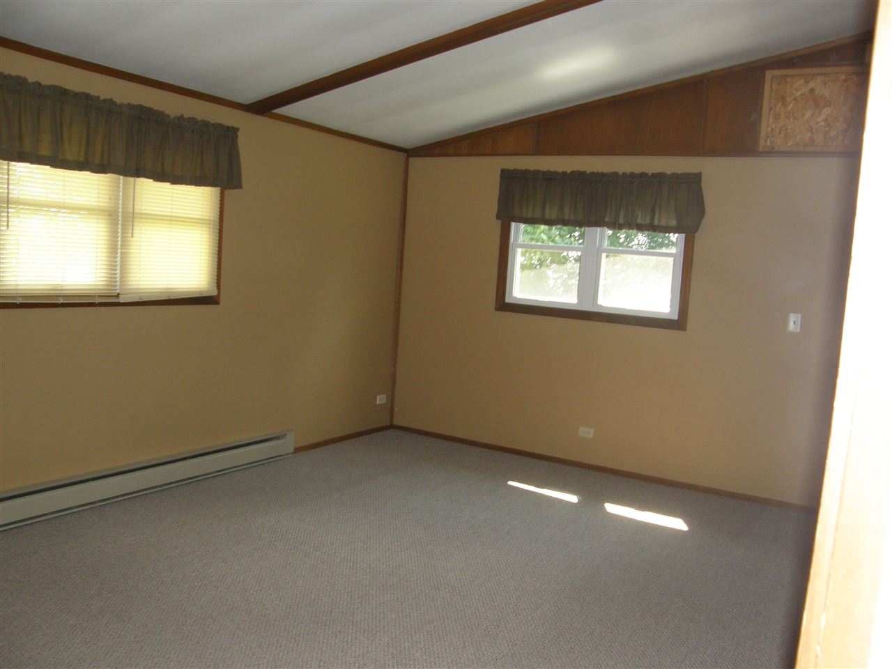 16700 Goodrich Road Durand, IL 61024 - Photo 12 of 18 an empty room with a window