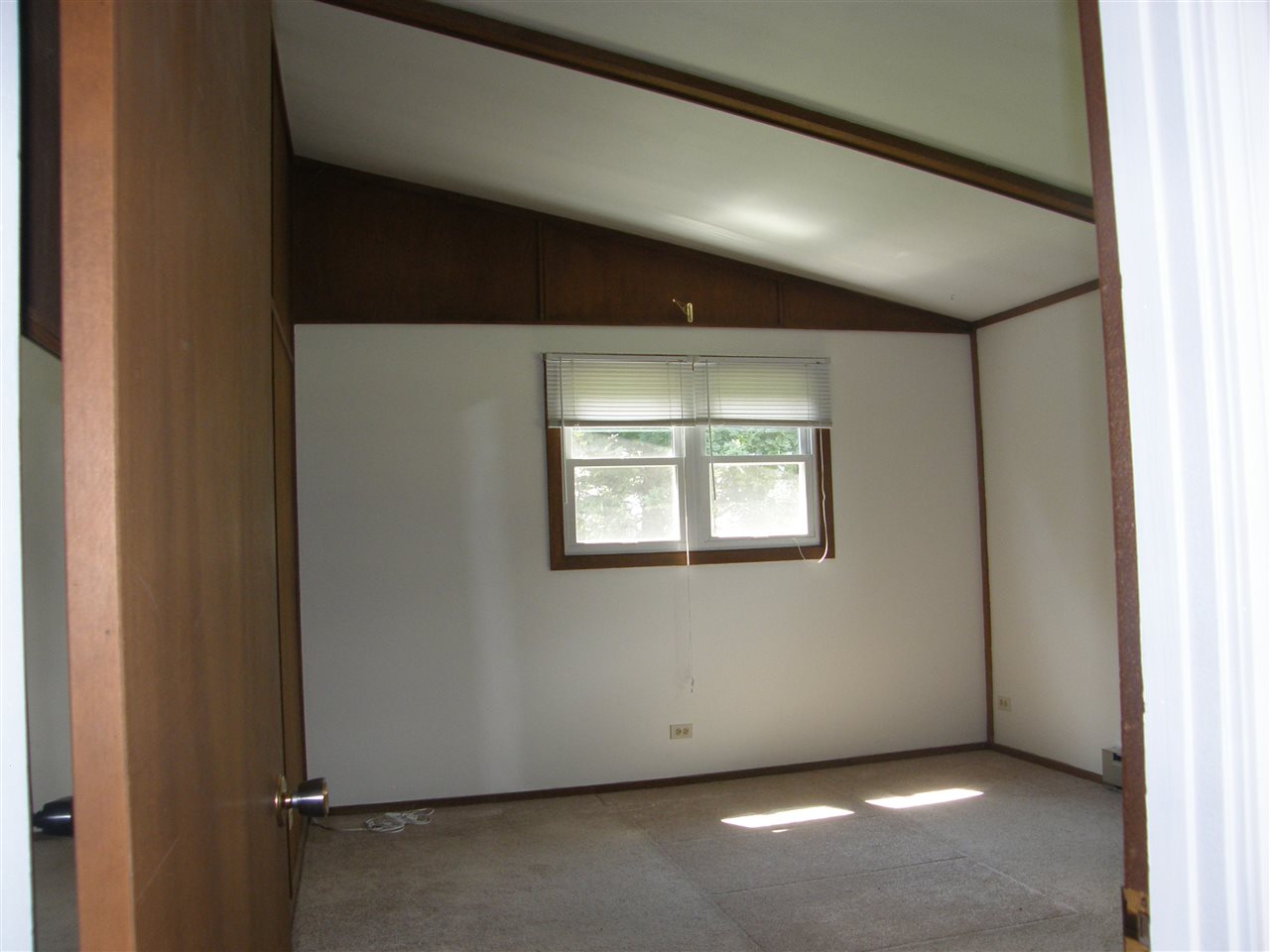 16700 Goodrich Road Durand, IL 61024 - Photo 13 of 18 a view of an empty room with a window