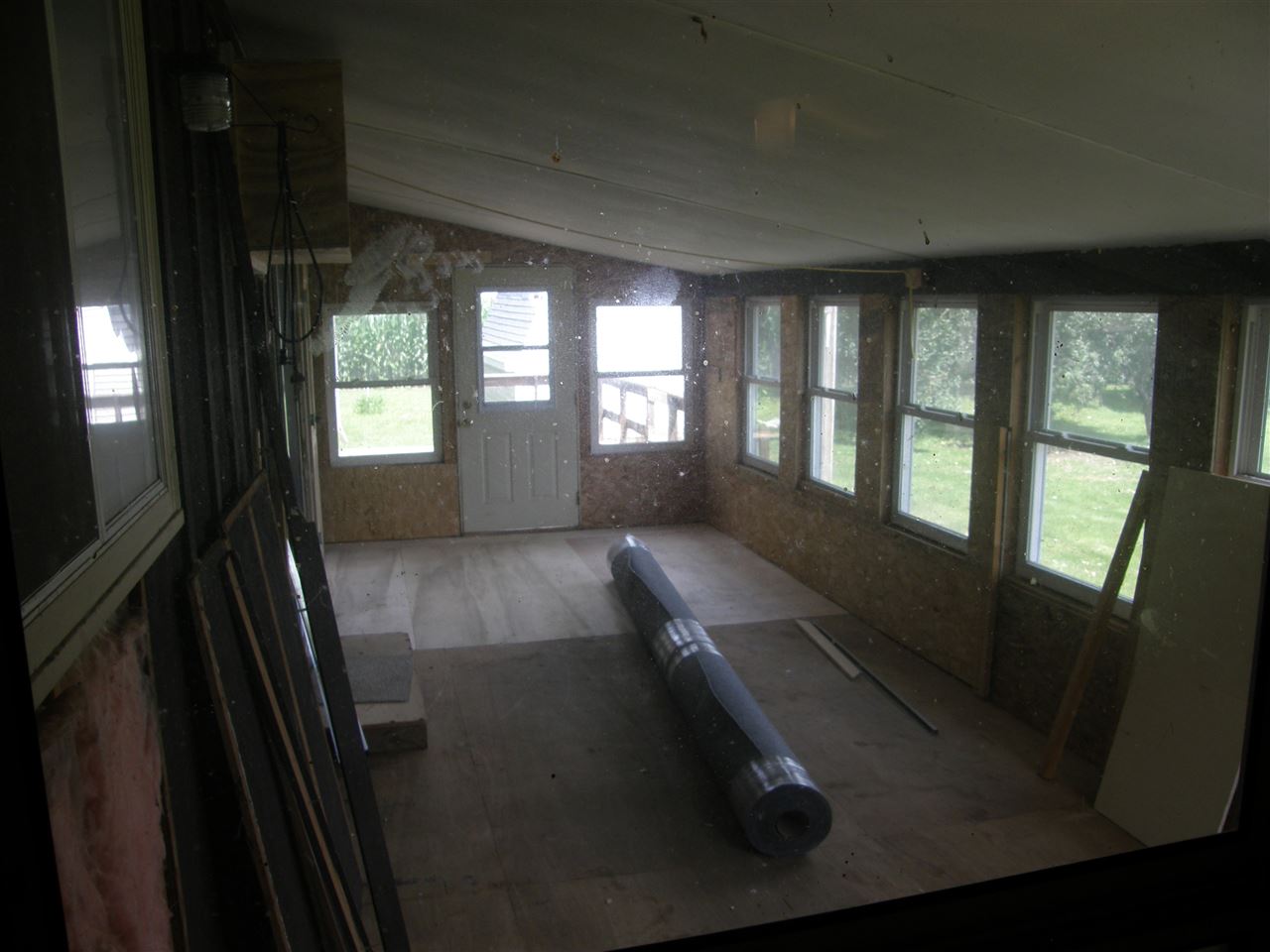 16700 Goodrich Road Durand, IL 61024 - Photo 14 of 18 a view of entryway and hall with wooden floor