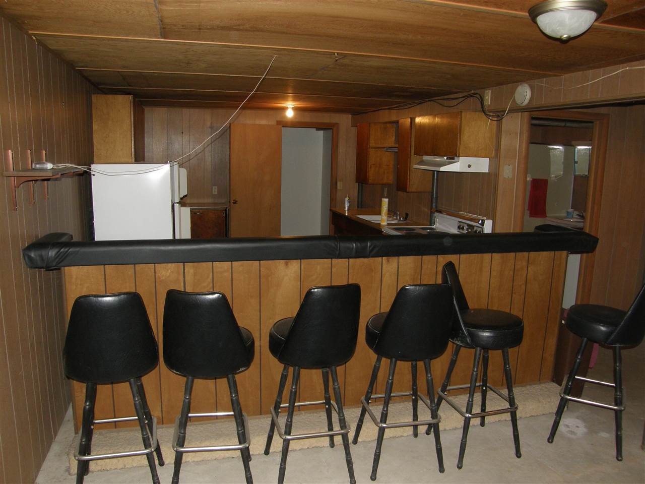 16700 Goodrich Road Durand, IL 61024 - Photo 16 of 18 a kitchen with a table and chairs in it