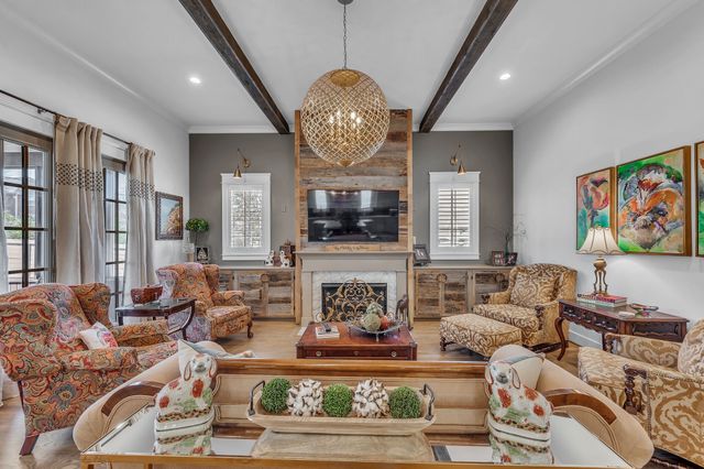 a kitchen with sink refrigerator and window