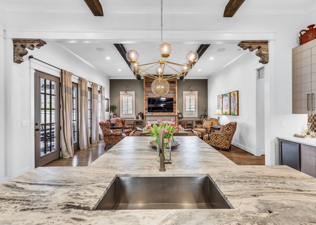 a spacious bathroom with a double vanity sink mirror double and shower