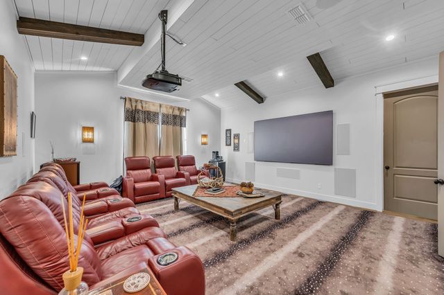 a work place with furniture and wooden floor