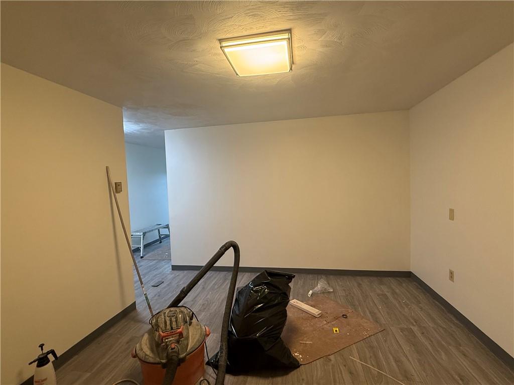 766 North Pike Road Cabot, PA 16023 - Photo 2 of 9 a view of a room with rack and wooden floor