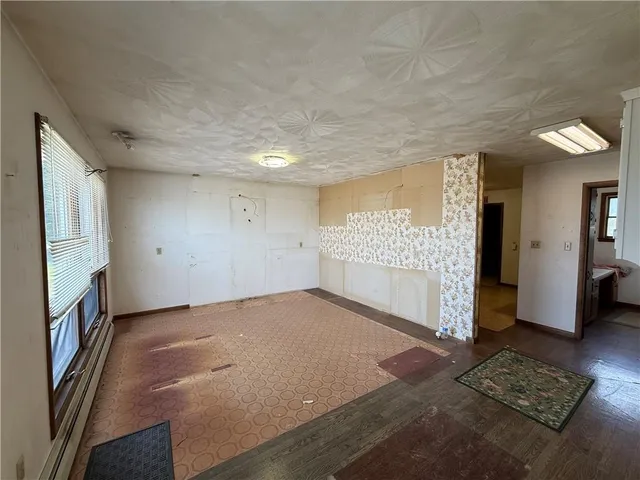 a view of an empty room and window