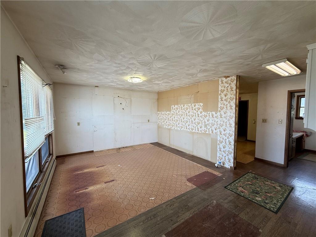 766 North Pike Road Cabot, PA 16023 - Photo 3 of 11 a view of an empty room and window