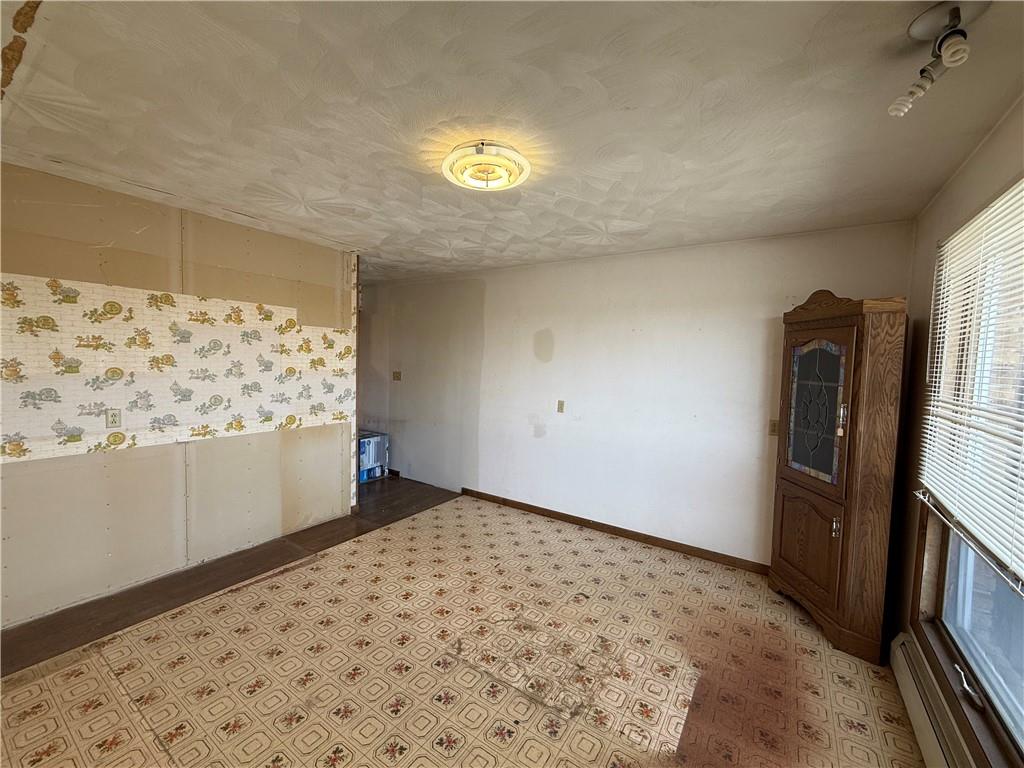 766 North Pike Road Cabot, PA 16023 - Photo 9 of 11 a view of an empty room and window