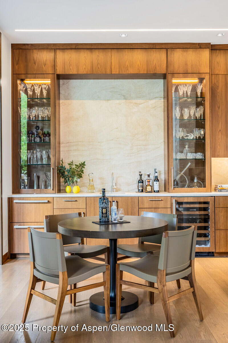 130 Primrose Path Aspen, CO 81611 - Photo 12 of 94 a view of a dining room with furniture window and outside view