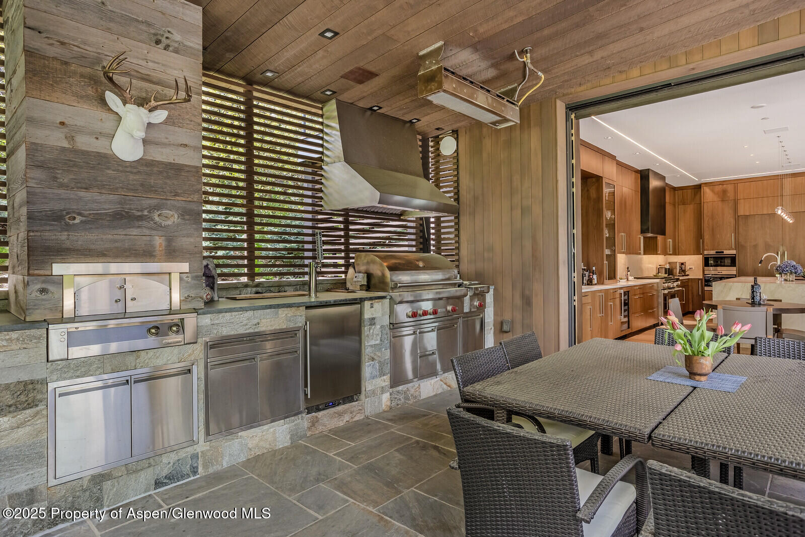 130 Primrose Path Aspen, CO 81611 - Photo 18 of 94 a kitchen with stainless steel appliances granite countertop a stove a sink dishwasher and cabinets