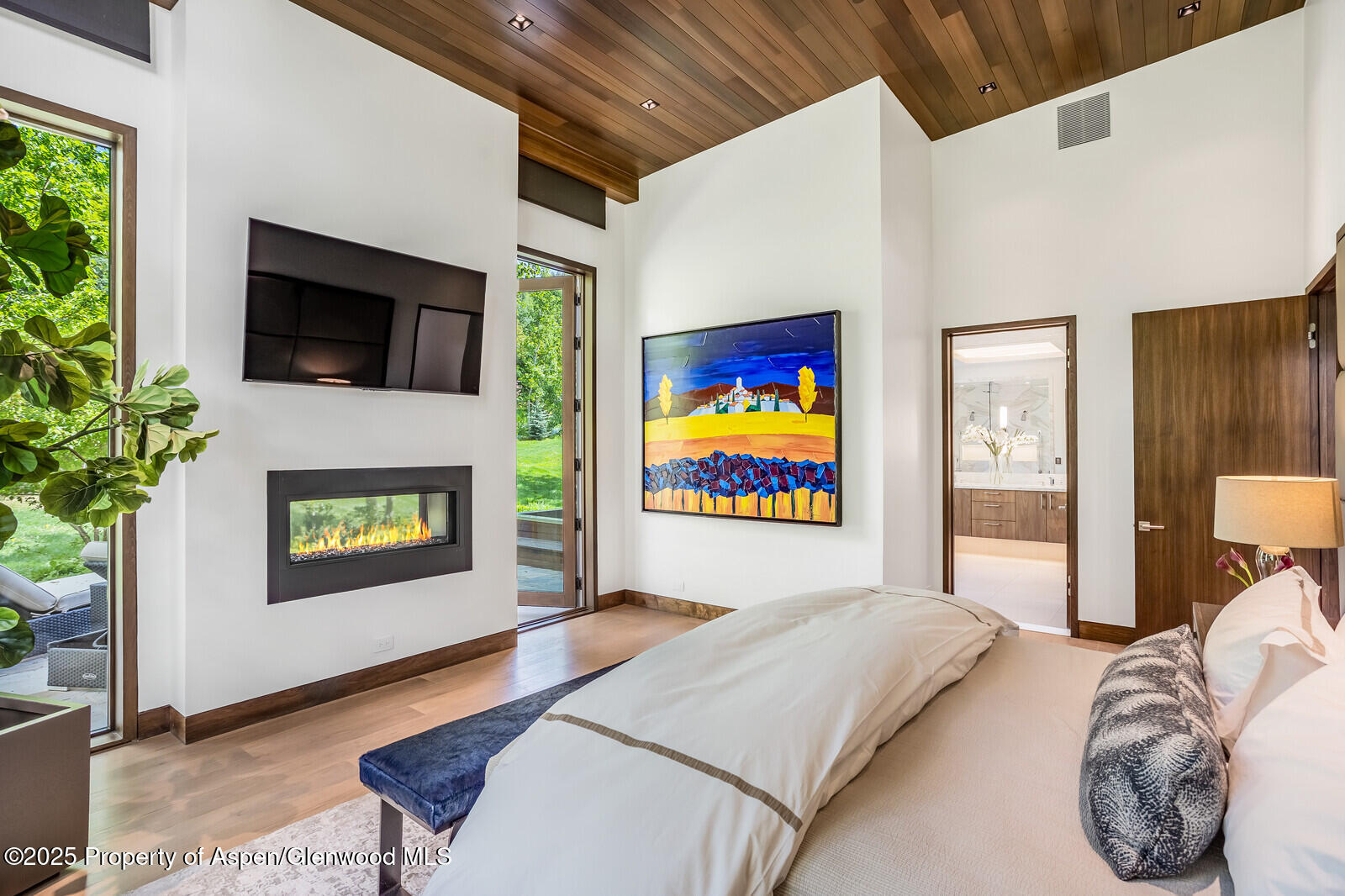 130 Primrose Path Aspen, CO 81611 - Photo 22 of 94 a living room with furniture and a flat screen tv