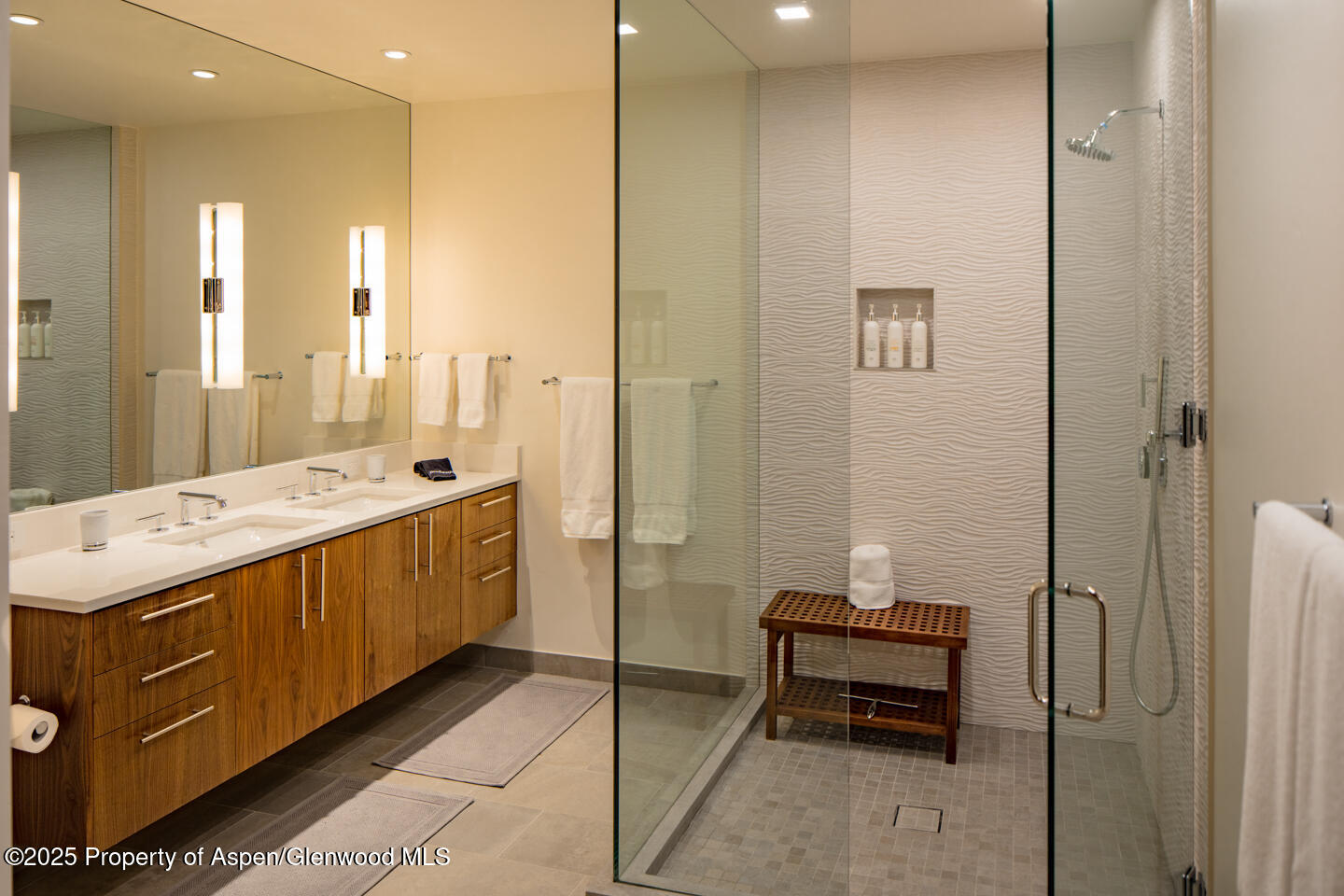 130 Primrose Path Aspen, CO 81611 - Photo 39 of 94 a bathroom with a double vanity sink and mirror