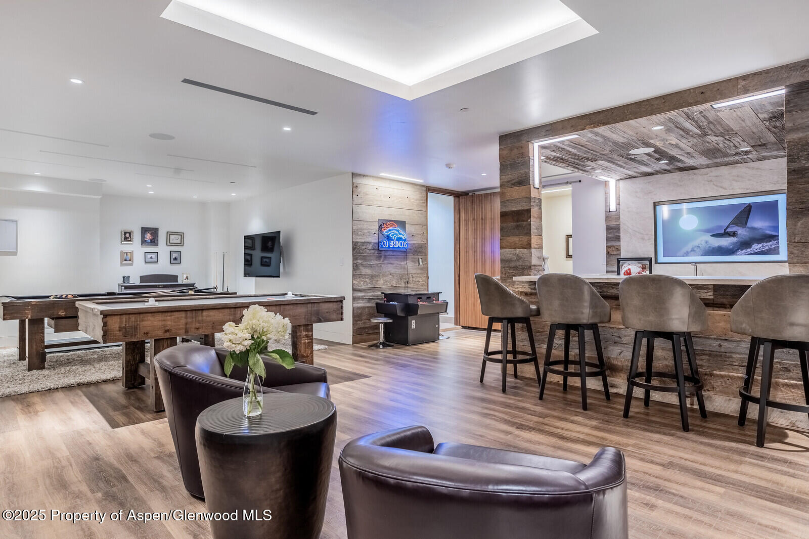 130 Primrose Path Aspen, CO 81611 - Photo 41 of 94 a living room with furniture and wooden floor