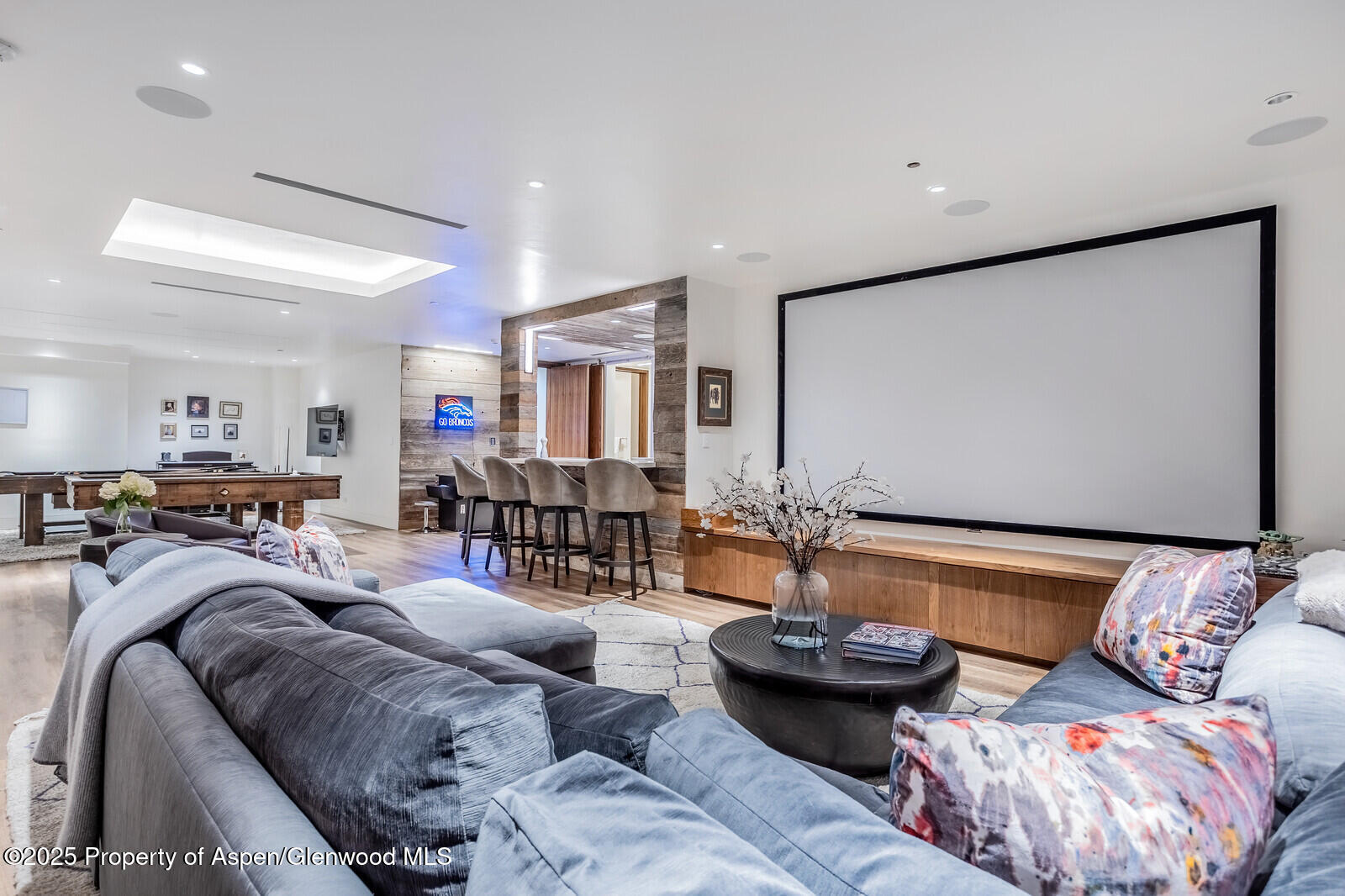 130 Primrose Path Aspen, CO 81611 - Photo 43 of 94 a living room with furniture and wooden floor