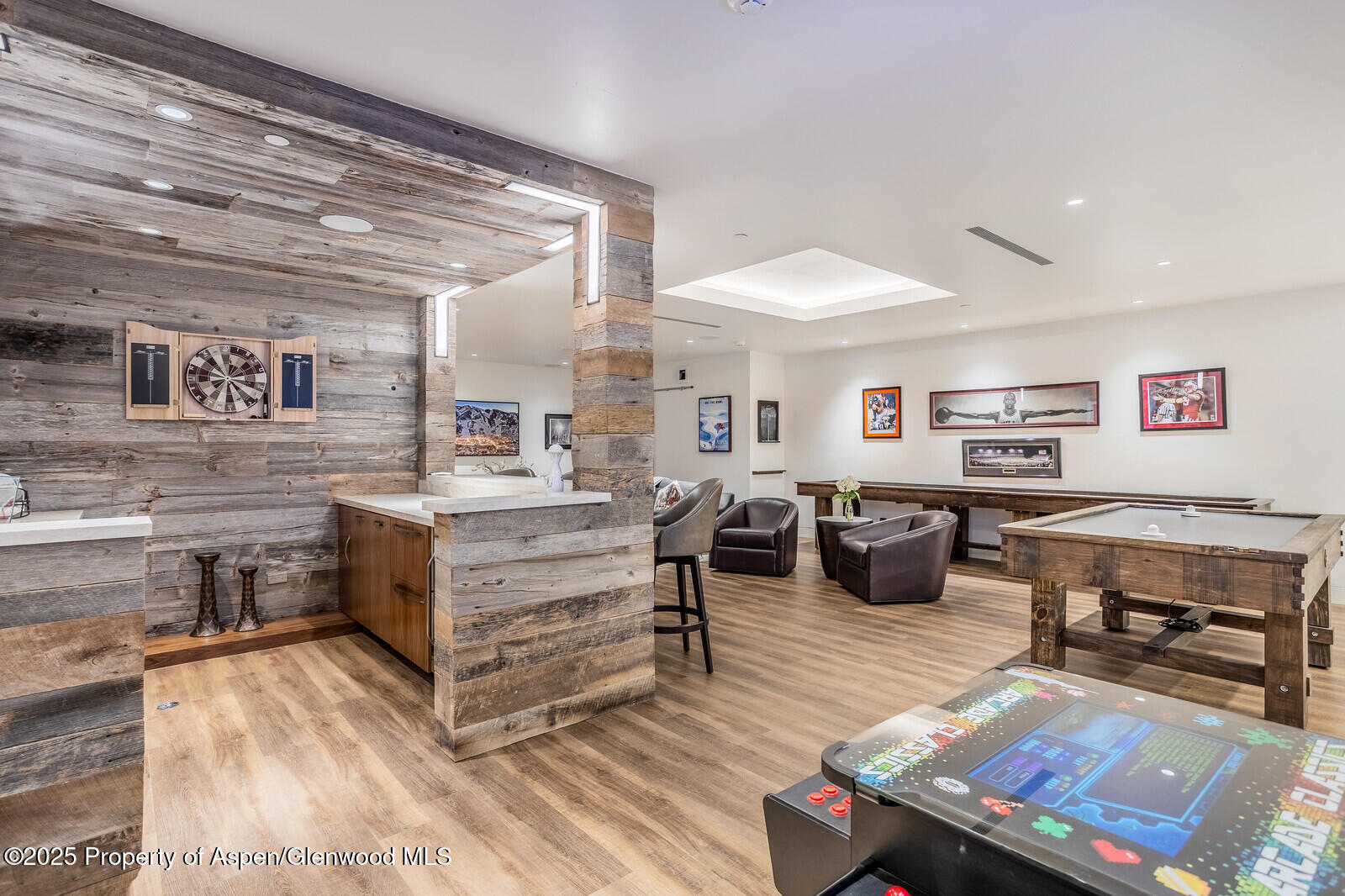 130 Primrose Path Aspen, CO 81611 - Photo 47 of 94 a living room with furniture and wooden floor