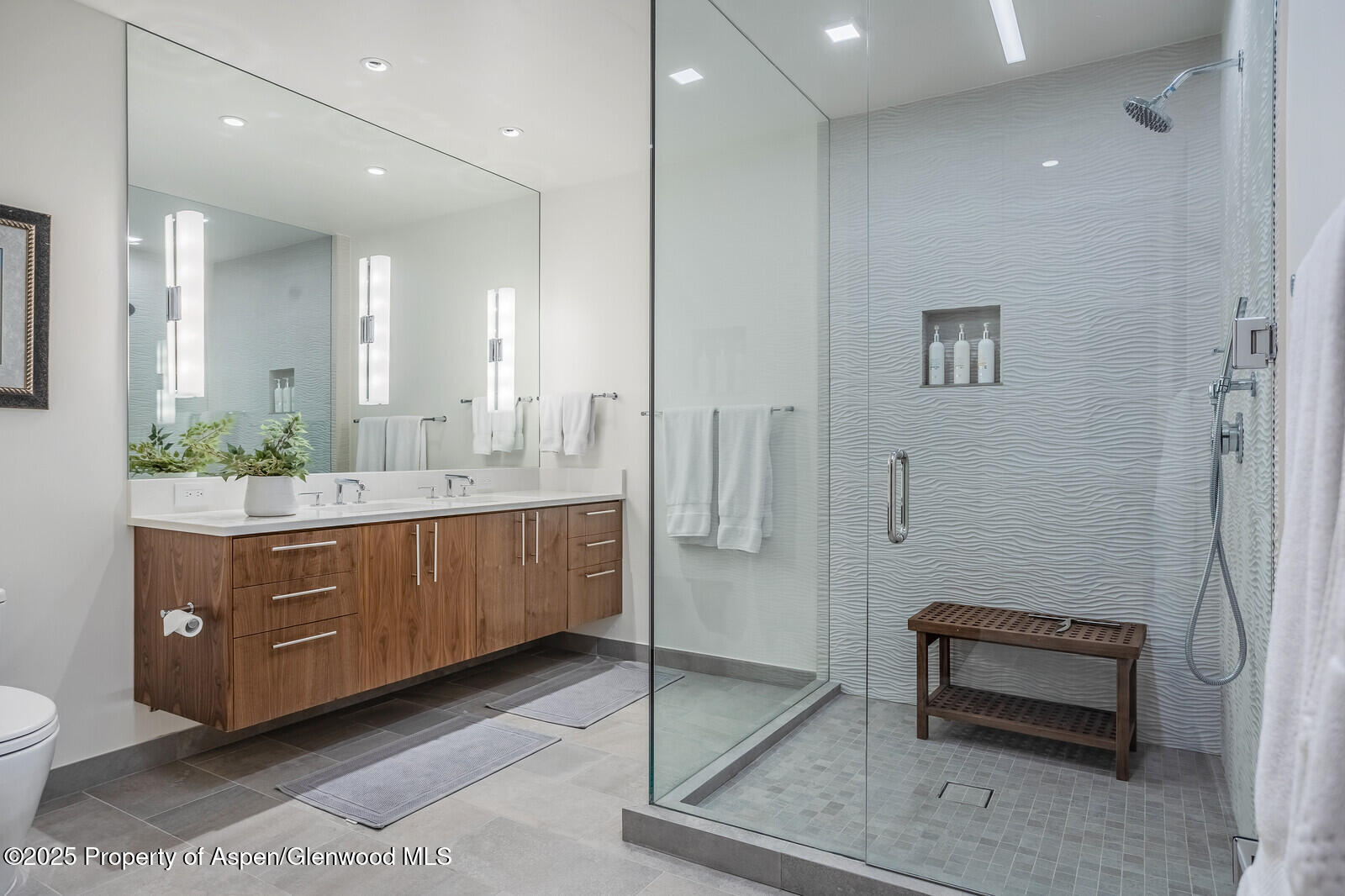 130 Primrose Path Aspen, CO 81611 - Photo 50 of 94 a bathroom with a sink a toilet and mirror