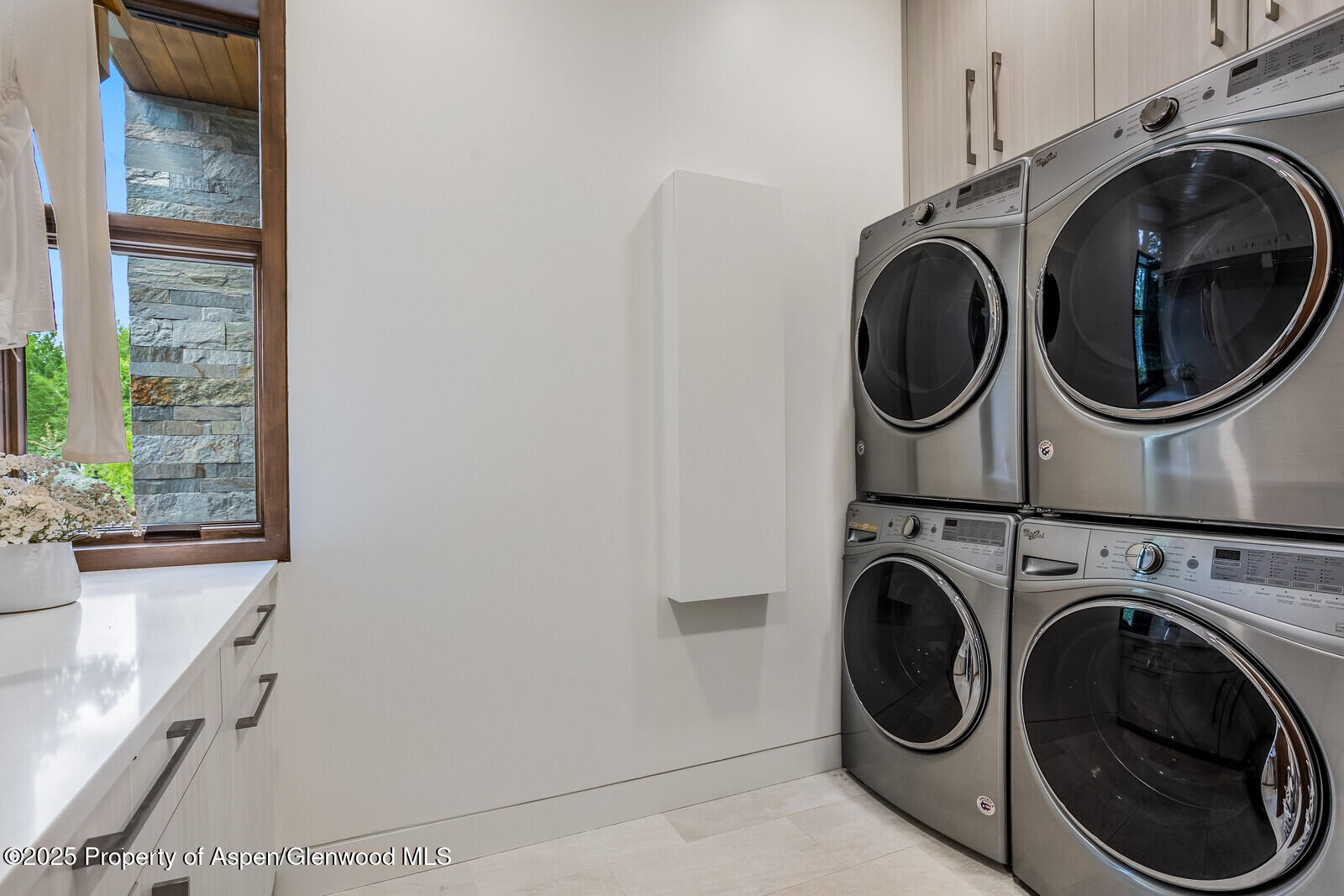 130 Primrose Path Aspen, CO 81611 - Photo 61 of 94 a utility room with sink dryer and washer