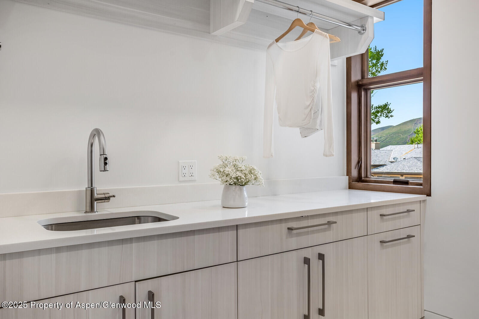 130 Primrose Path Aspen, CO 81611 - Photo 62 of 94 a kitchen with a sink and a window