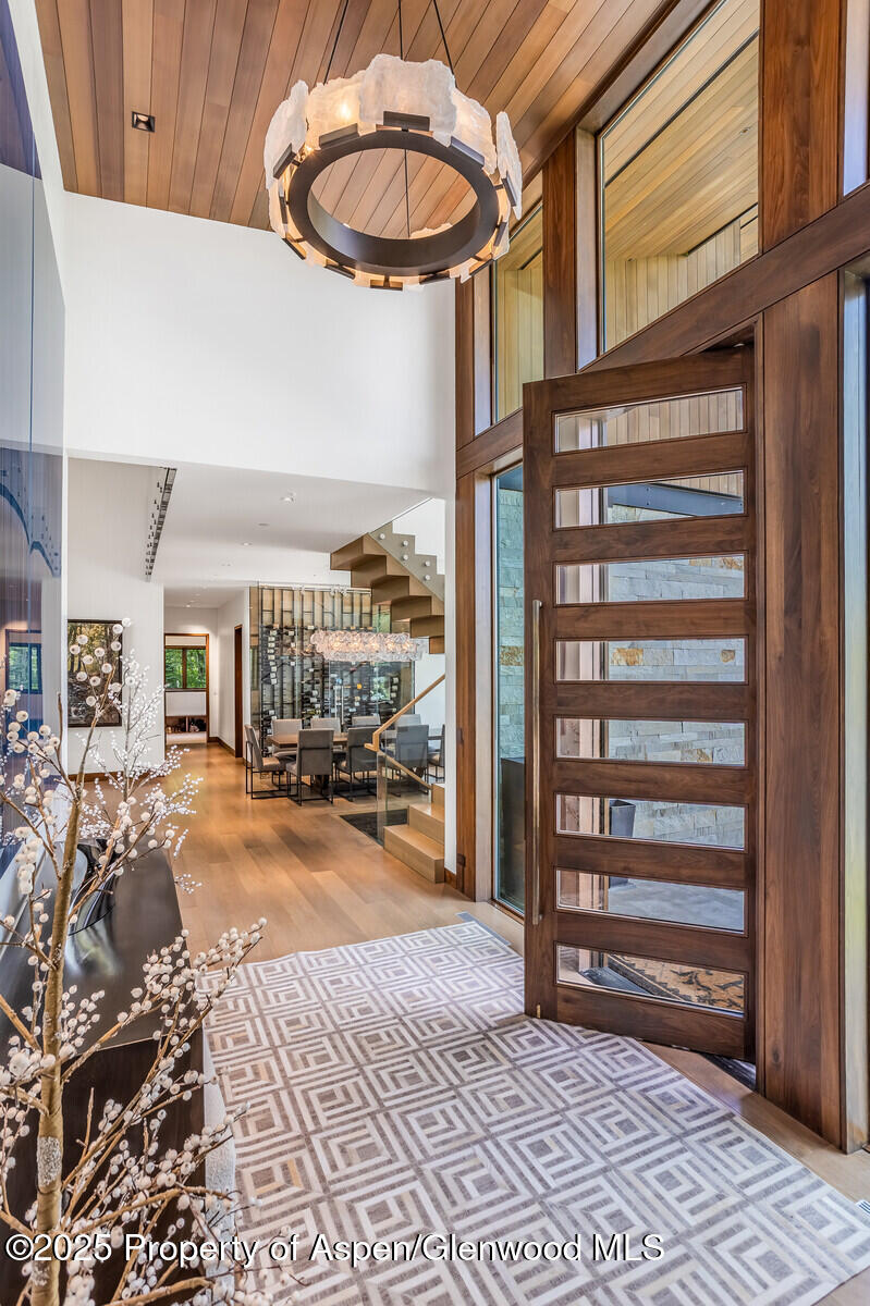 130 Primrose Path Aspen, CO 81611 - Photo 69 of 94 a view of a livingroom with a dinning table and chair