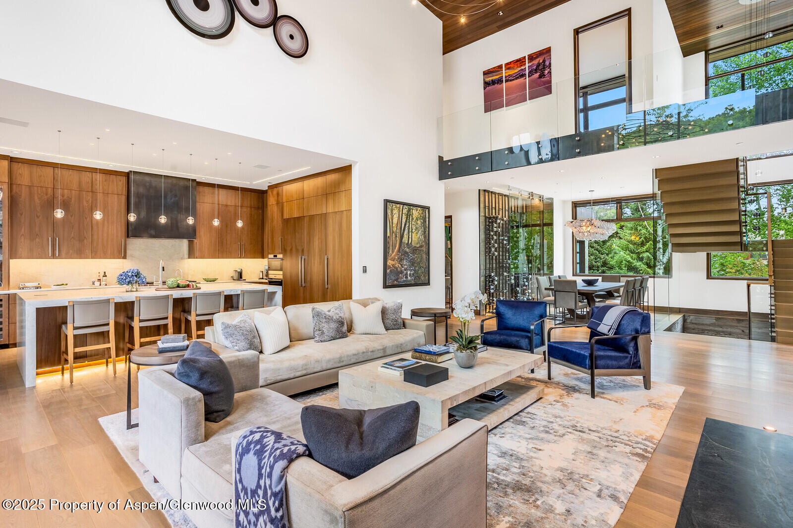 130 Primrose Path Aspen, CO 81611 - Photo 7 of 94 a living room with furniture kitchen view and large windows