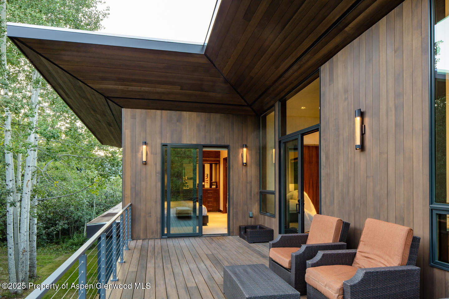 130 Primrose Path Aspen, CO 81611 - Photo 92 of 94 a balcony with furniture and wooden floor