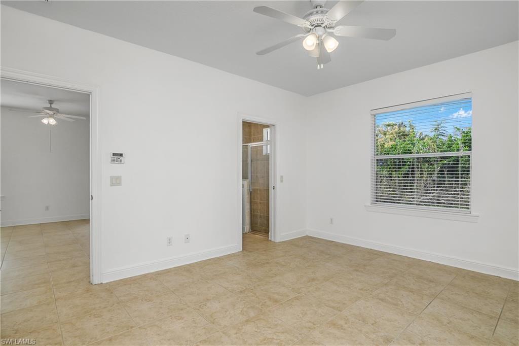 2119 River Ridge Boulevard Fort Myers, FL 33905 - Photo 12 of 19 Main Suite with on-suite Bathroom featuring a shower and water closet.