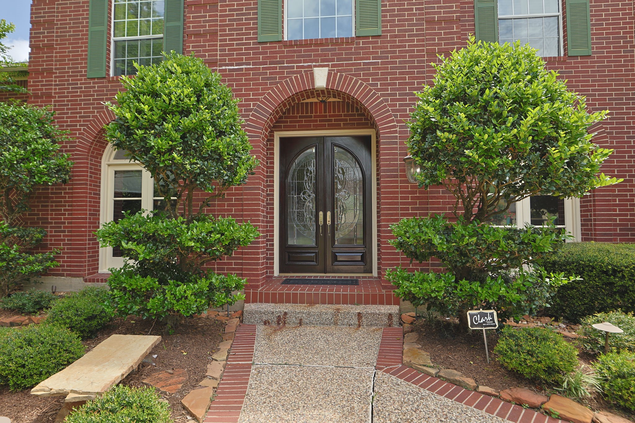 18310 Pamela Way Spring, TX 77379 - Photo 2 of 42 Mature landscaping and trees border the home