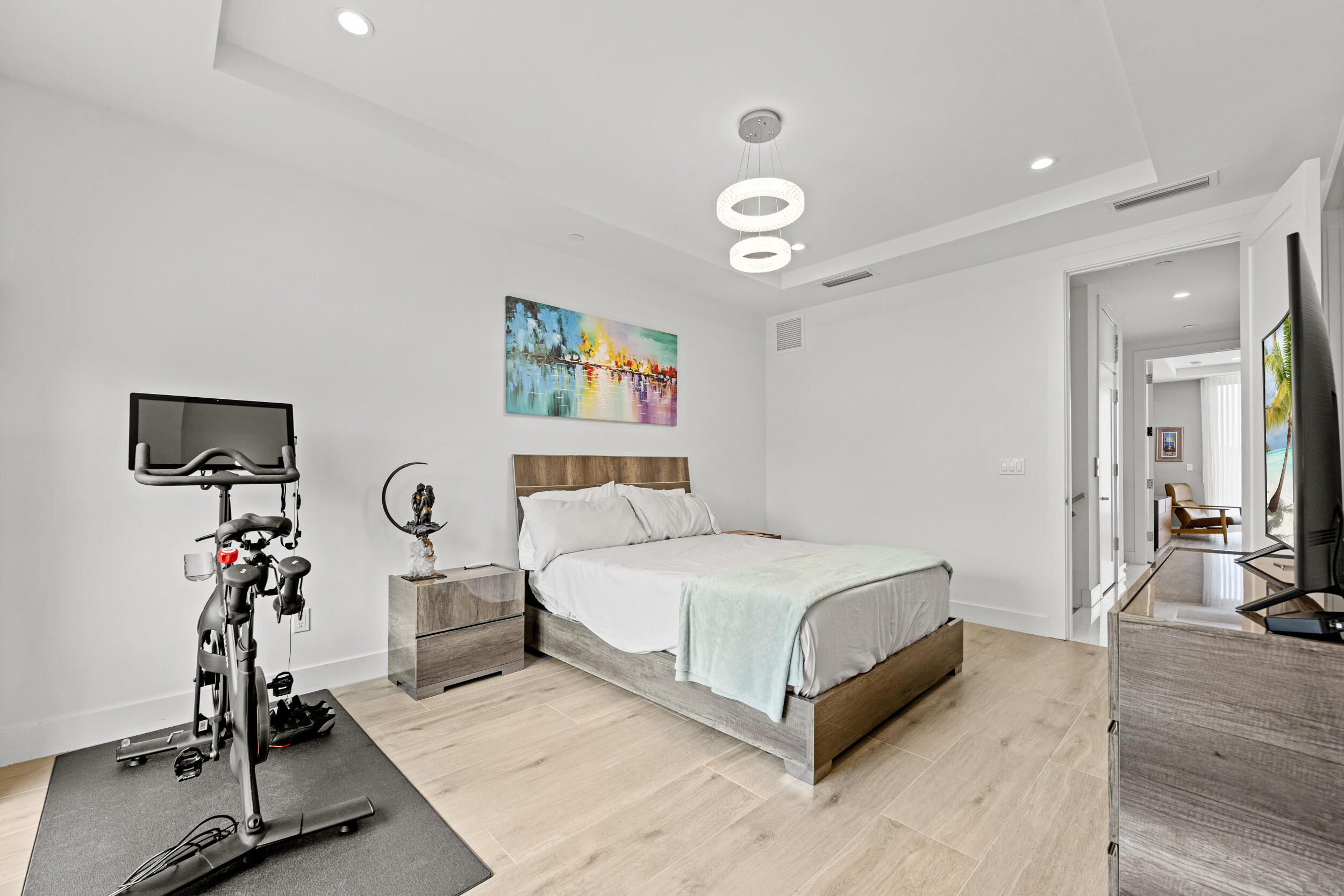 1811 Northwest 42nd Drive Boca Raton, FL 33431 - Photo 27 of 51 a spacious bedroom with a bed and a desk