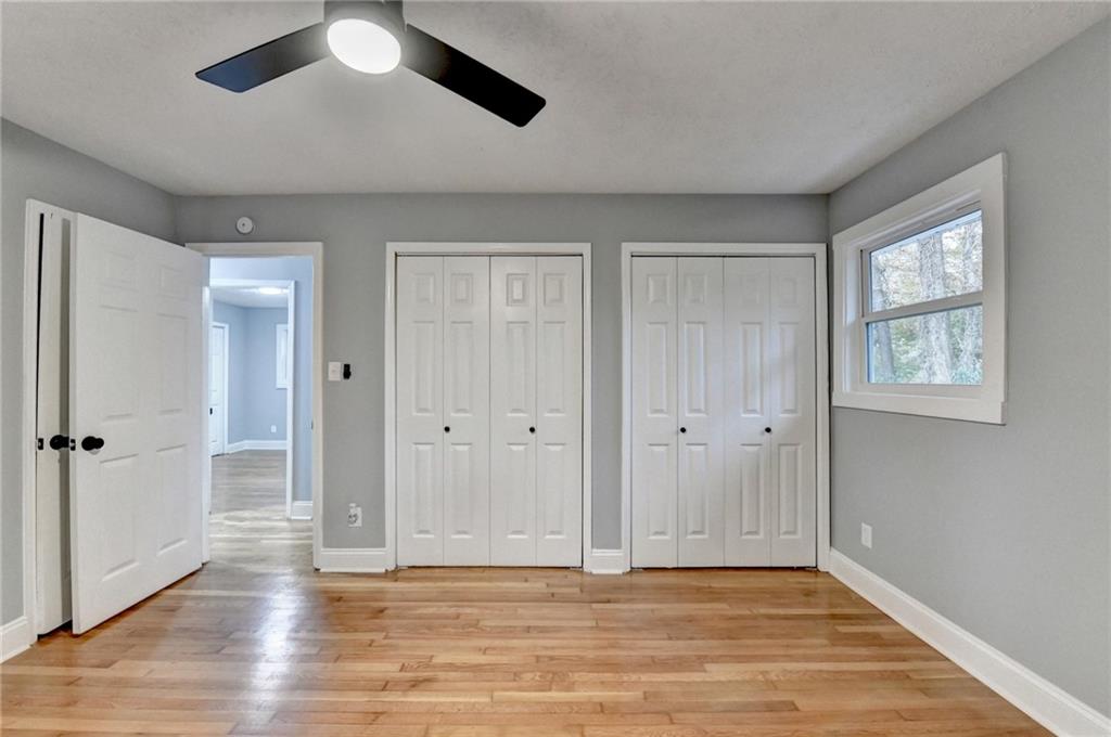 5169 Oxbow Road Stone Mountain, GA 30087 - Photo 38 of 58 a view of an empty room with wooden floor