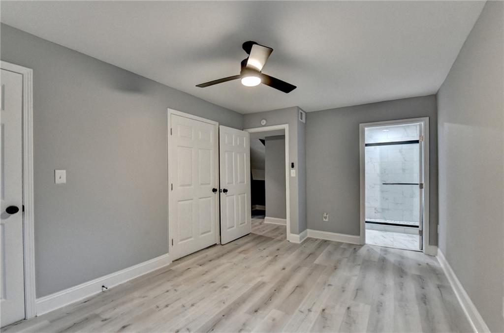 5169 Oxbow Road Stone Mountain, GA 30087 - Photo 40 of 58 a view of empty room with wooden floor