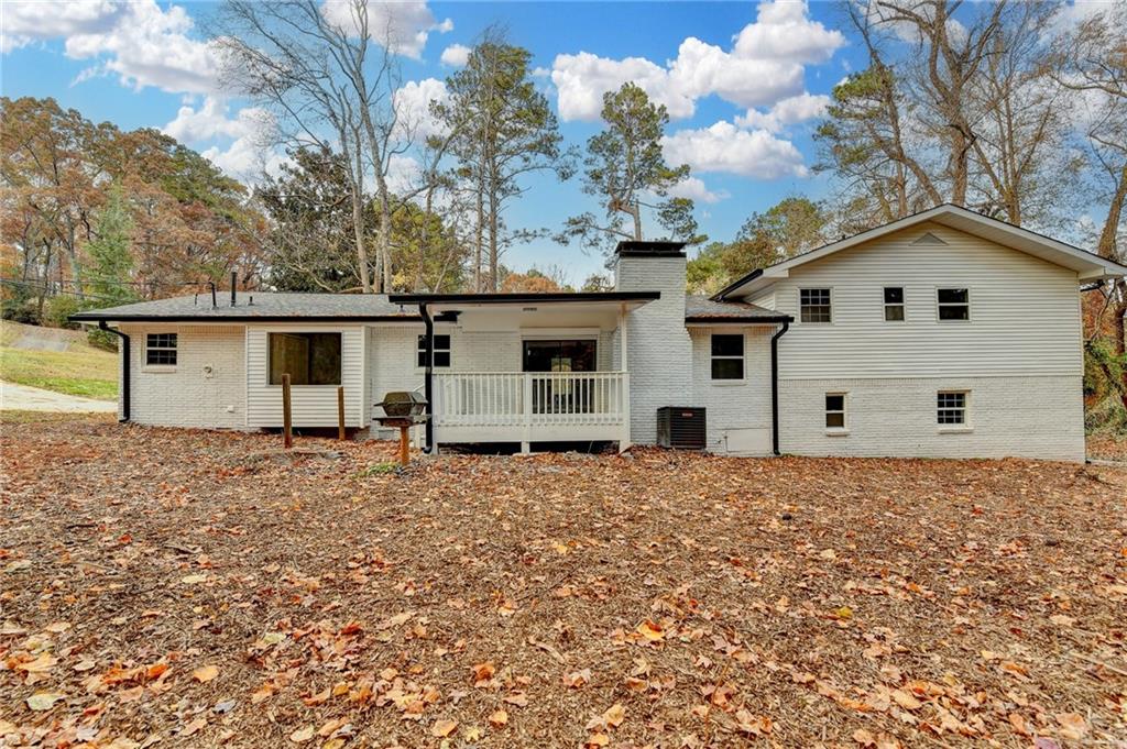 5169 Oxbow Road Stone Mountain, GA 30087 - Photo 54 of 58 front view of house with a yard