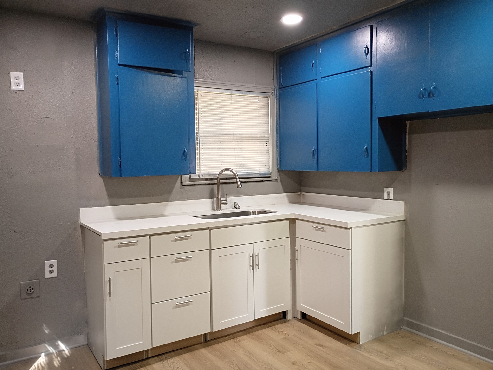 5617 Malmedy Road Houston, TX 77033 - Photo 4 of 12 a utility room with cabinets washer and dryer