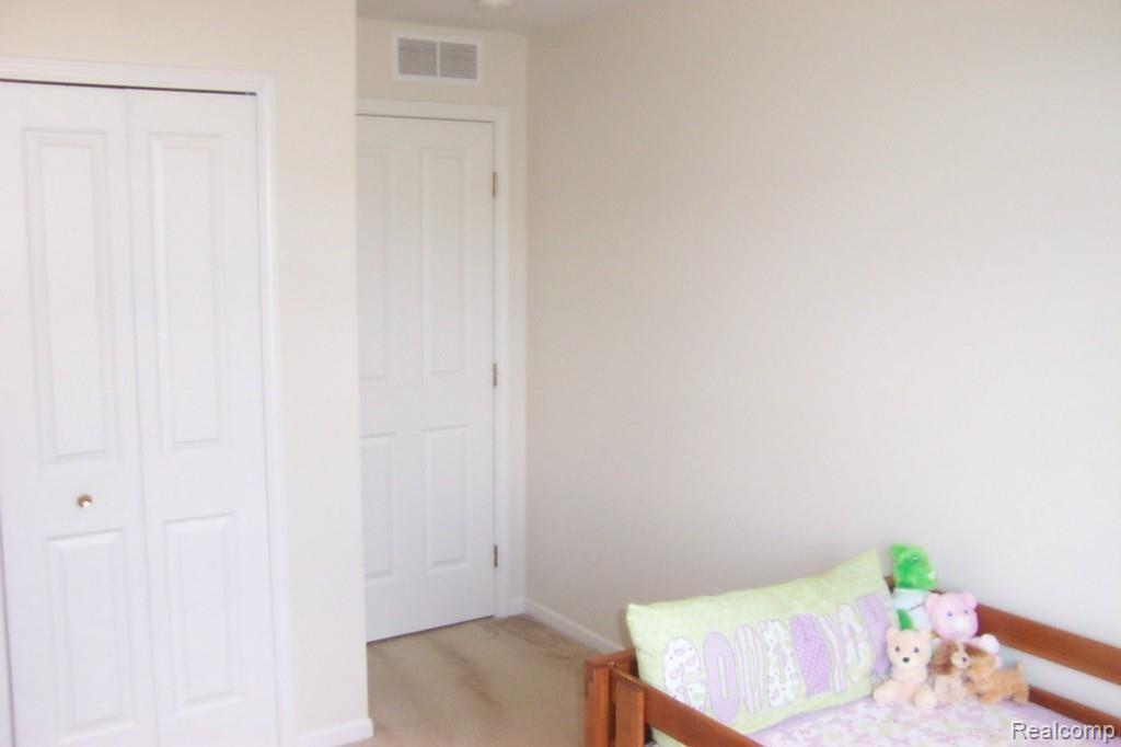 4257 Hampton Ridge Boulevard, Unit 132 Howell, MI 48843 - Photo 14 of 22 2nd bedroom 2