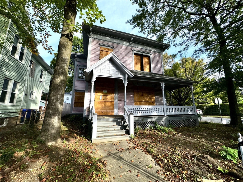 146 Bay Street Springfield, MA 01109 - Photo 2 of 39 a front view of a house with a yard