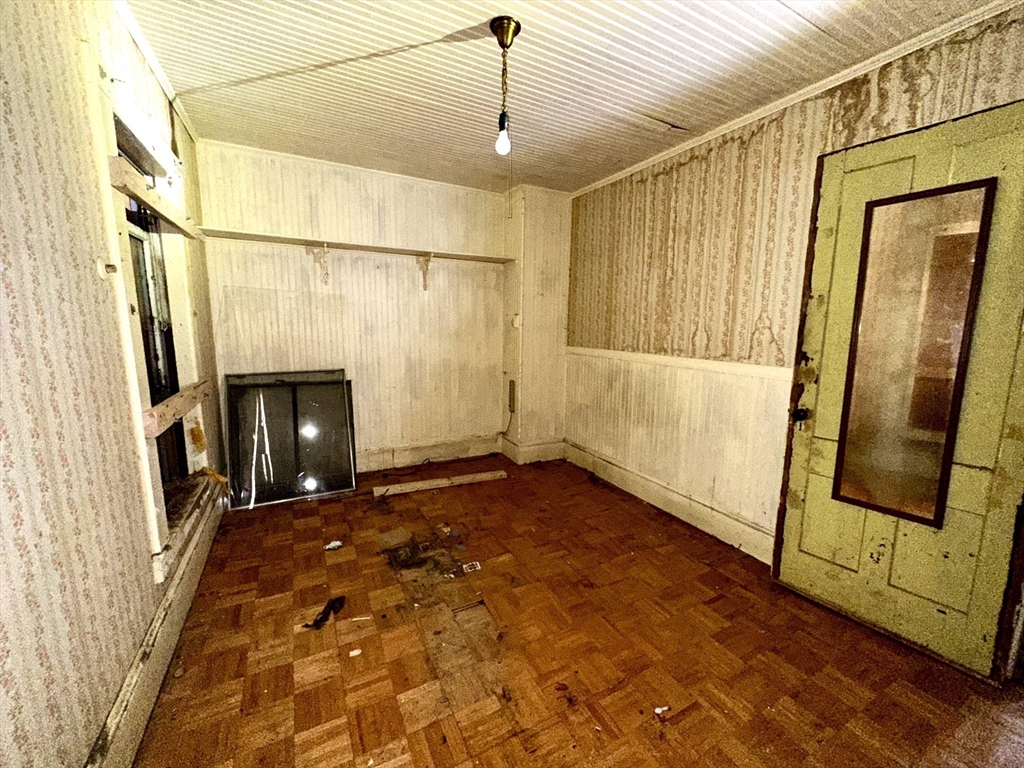 146 Bay Street Springfield, MA 01109 - Photo 25 of 39 a view of an empty room with a fireplace