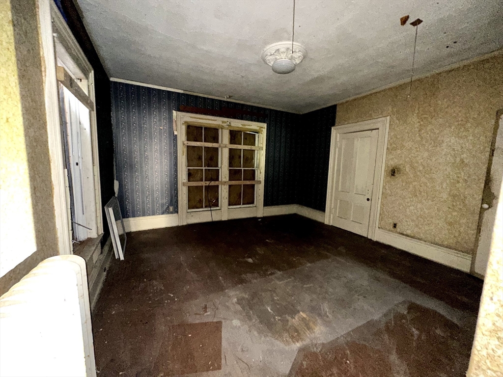 146 Bay Street Springfield, MA 01109 - Photo 10 of 39 a view of an empty room with a window