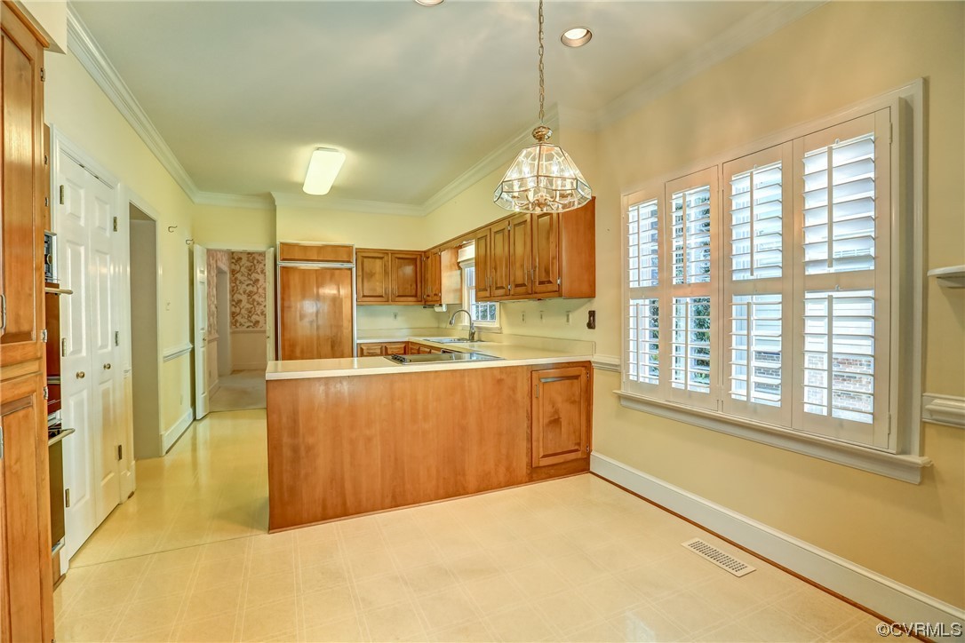 505 St Albans Way Henrico, VA 23229 - Photo 15 of 36 a view of a kitchen with a refrigerator cabinets and a wooden floor