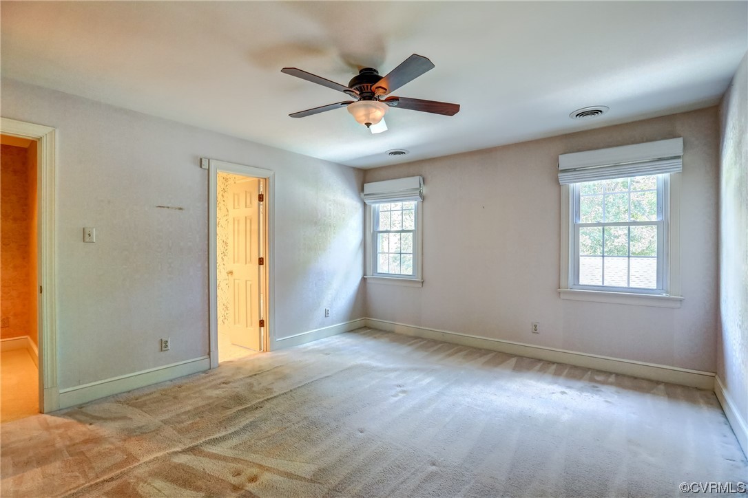 505 St Albans Way Henrico, VA 23229 - Photo 21 of 36 a view of a livingroom with a ceiling fan and window